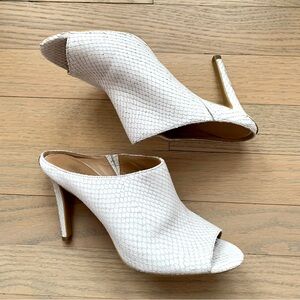 Calvin Klein white snakeskin heeled mules
